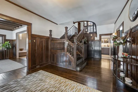 a view of a living room and entry way