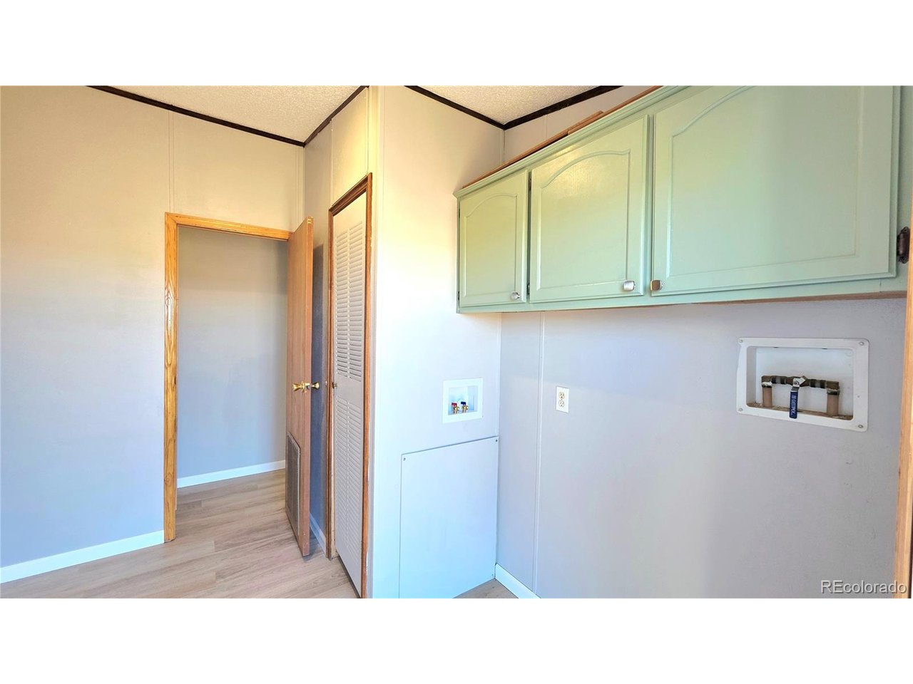 10754 County Road East Olney Springs, CO 81062 - Photo 28 of 49 a bathroom with a sink and a mirror