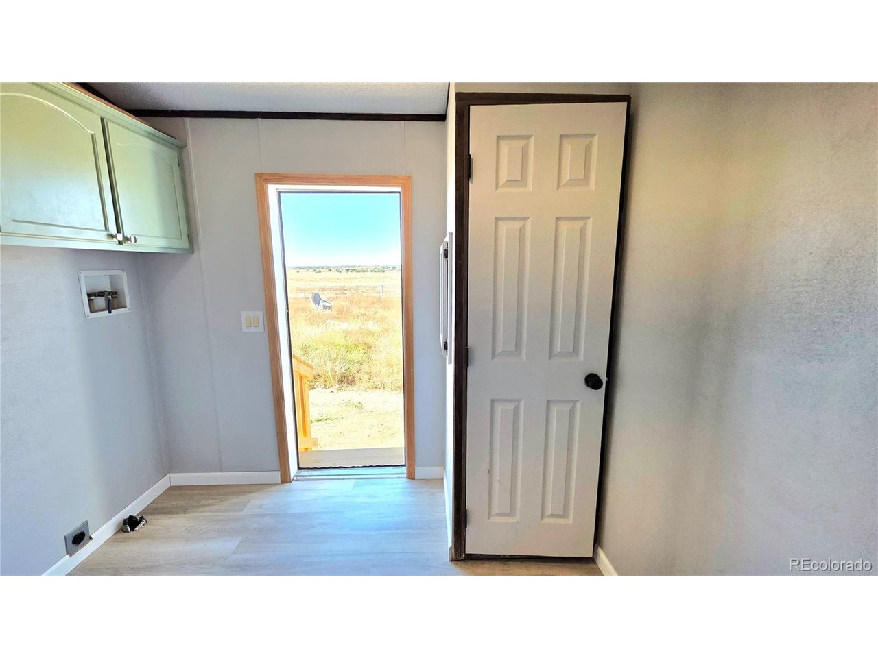 10754 County Road East Olney Springs, CO 81062 - Photo 29 of 49 a black and white photo of a room
