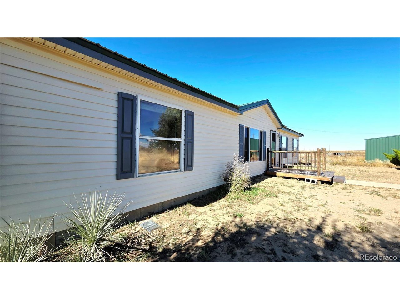 10754 County Road East Olney Springs, CO 81062 - Photo 5 of 49 a view of house with backyard of house