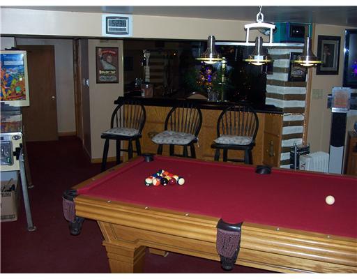 1015 2nd Street McKees Rocks, PA 15136 - Photo 14 of 18 Den/Family/Great Room. ENTERTAIN AT THE WET BAR WITH REFRIGERATOR