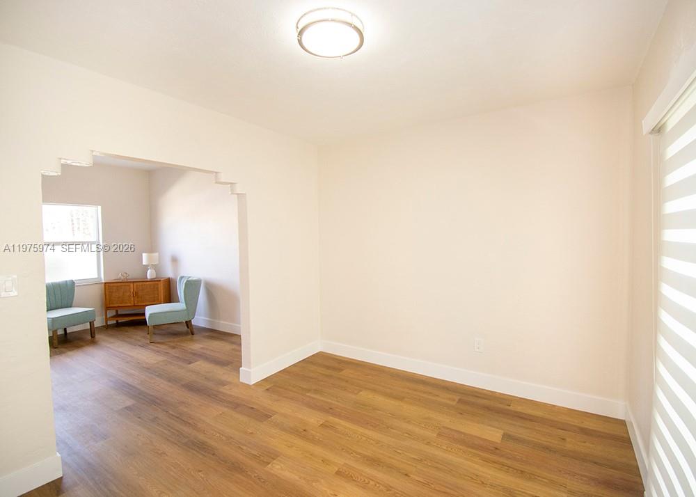3200 Southwest 2nd Street Miami, FL 33135 - Photo 6 of 10 a view of empty room with wooden floor