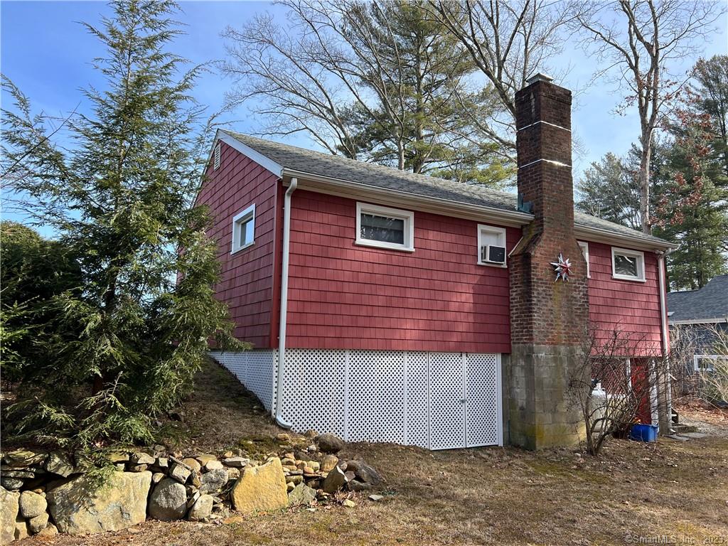 252 Lakeside Drive Lebanon, CT 06249 - Photo 1 of 12 a front view of a house with a yard