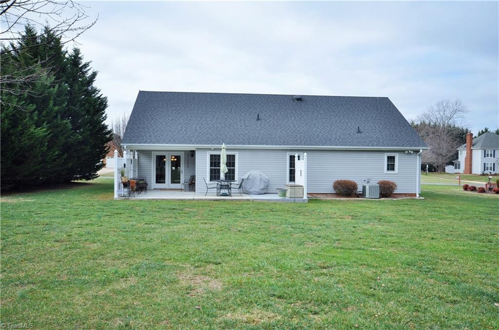 549 Adams Gate Road Winston-Salem, NC 27107 - Photo 24 of 30 Back of home showing patio and level yard.