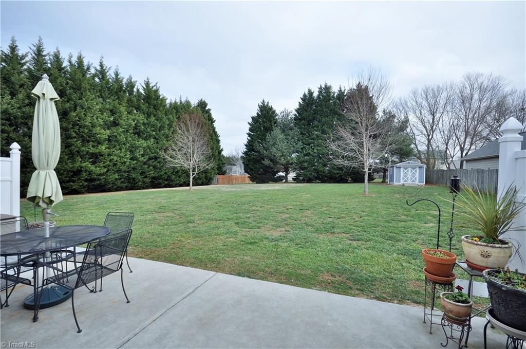 549 Adams Gate Road Winston-Salem, NC 27107 - Photo 26 of 30 Enjoy your large level back yard. Great area for entertaining.
