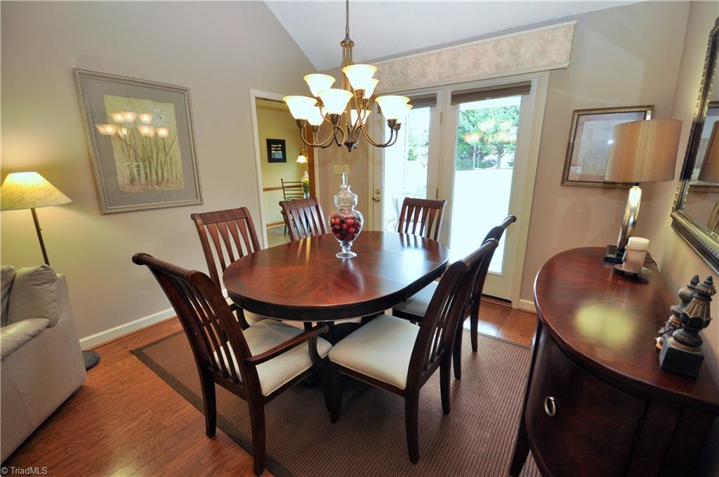 549 Adams Gate Road Winston-Salem, NC 27107 - Photo 5 of 30 Formal dining room with a handmade wooden valance over the double doors leading to the patio and back yard.