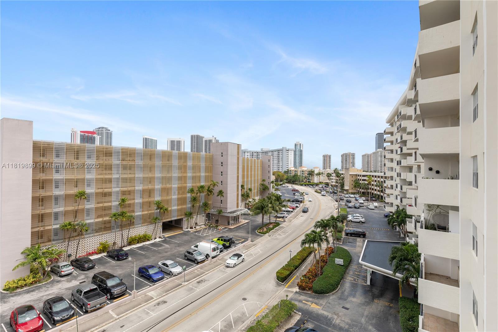 401 Golden Isles Drive, Unit 613 Hallandale Beach, FL 33009 - Photo 11 of 39 a view of a city with tall buildings