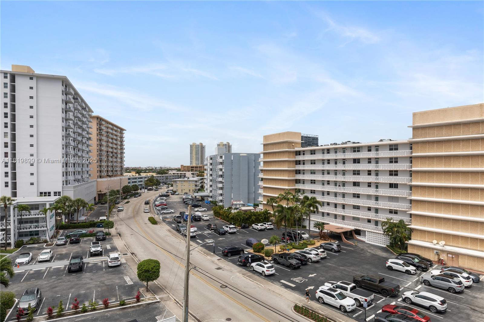 401 Golden Isles Drive, Unit 613 Hallandale Beach, FL 33009 - Photo 13 of 39 a city view with tall buildings