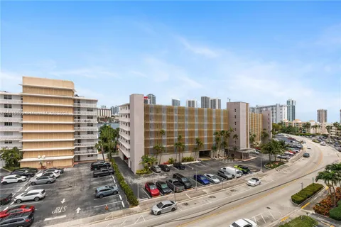 a view of a city with tall buildings