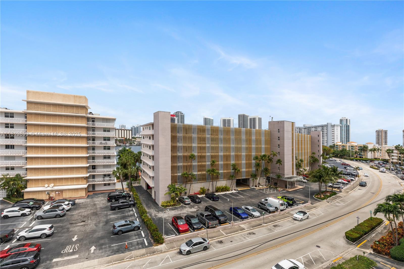 401 Golden Isles Drive, Unit 613 Hallandale Beach, FL 33009 - Photo 14 of 39 a view of a city with tall buildings