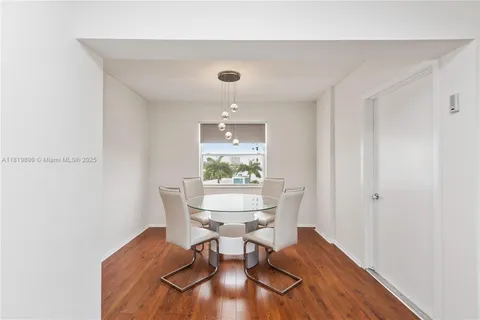 a workspace with furniture and wooden floor