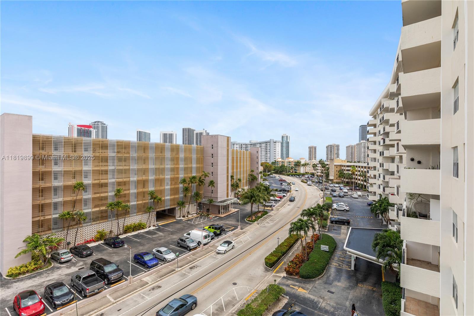 401 Golden Isles Drive, Unit 613 Hallandale Beach, FL 33009 - Photo 8 of 39 a view of a city with tall buildings
