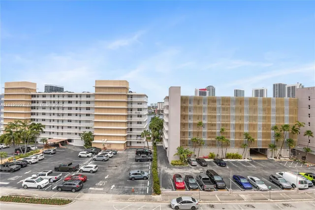 a view of a city with tall buildings