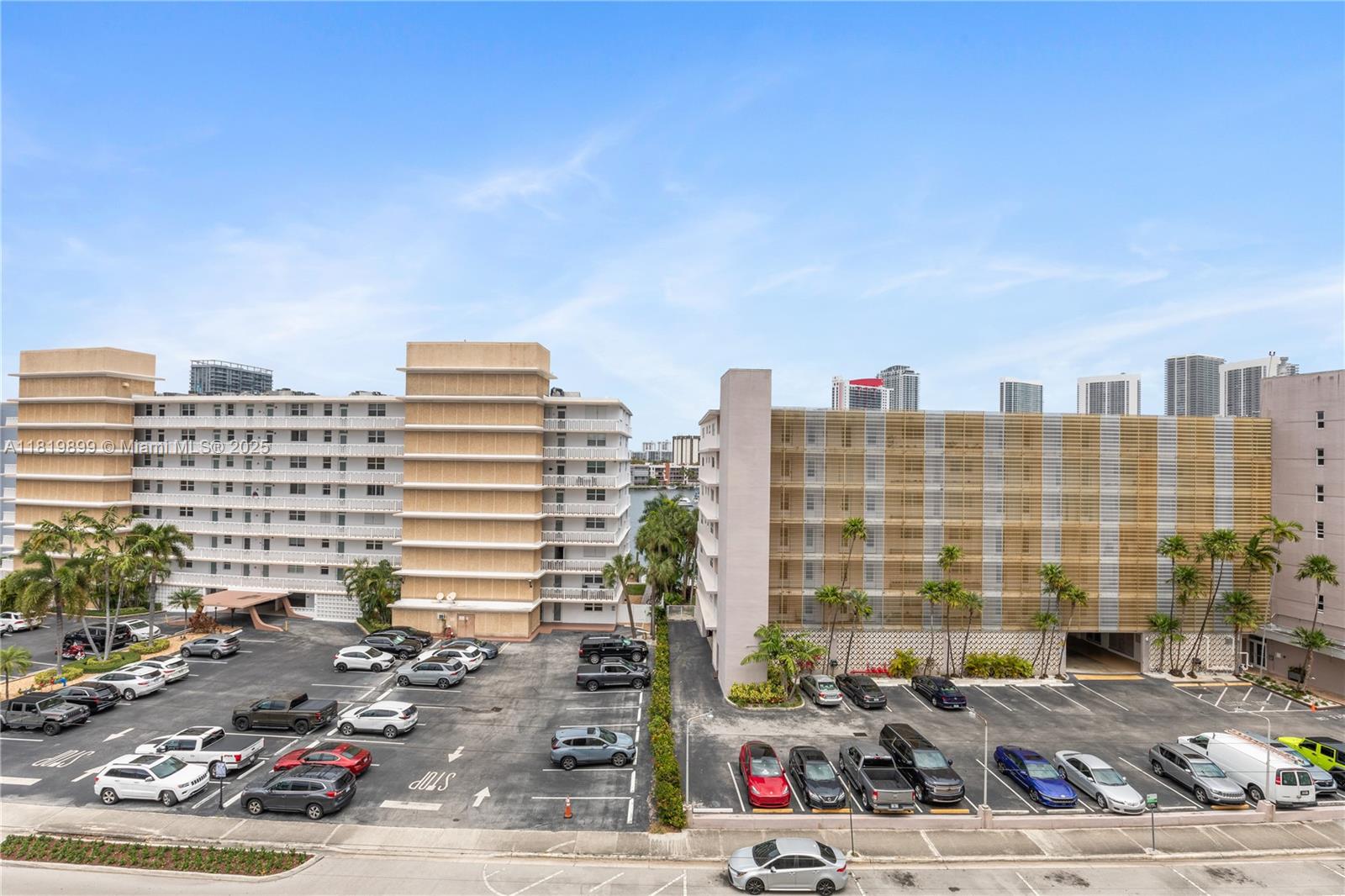 401 Golden Isles Drive, Unit 613 Hallandale Beach, FL 33009 - Photo 9 of 39 a view of a city with tall buildings