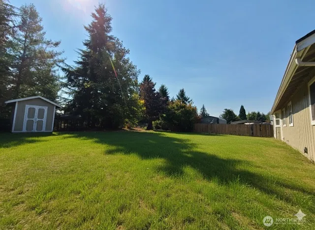 a house with garden in front of it