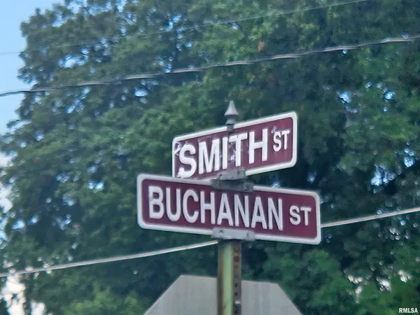 a street sign that is on a pole