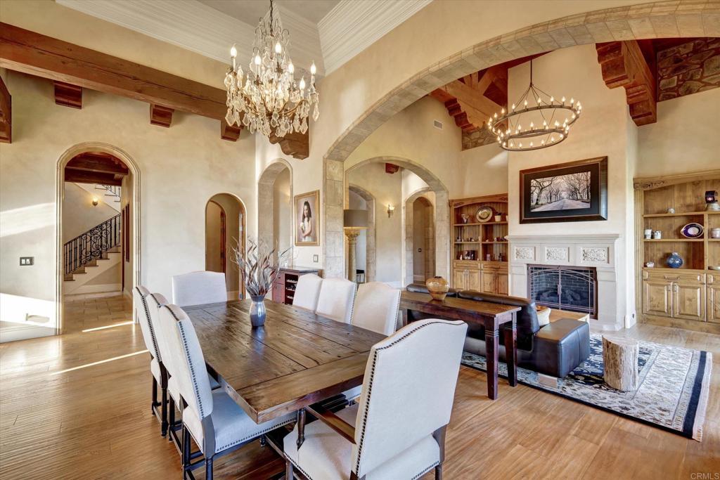 18179 El Brazo Rancho Santa Fe, CA 92067 - Photo 11 of 69 a view of a dining room with furniture and a chandelier