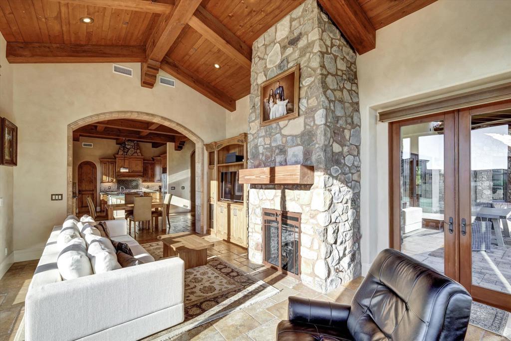 18179 El Brazo Rancho Santa Fe, CA 92067 - Photo 18 of 69 a living room with furniture and a floor to ceiling window