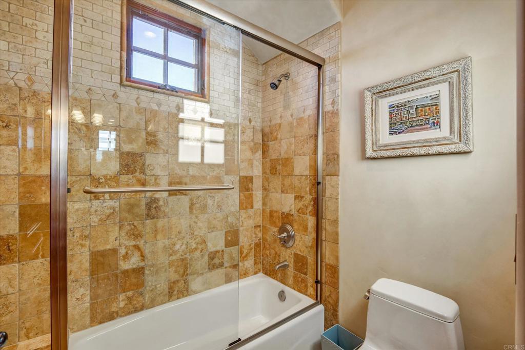 18179 El Brazo Rancho Santa Fe, CA 92067 - Photo 40 of 69 a bathroom with a shower a toilet and a sink