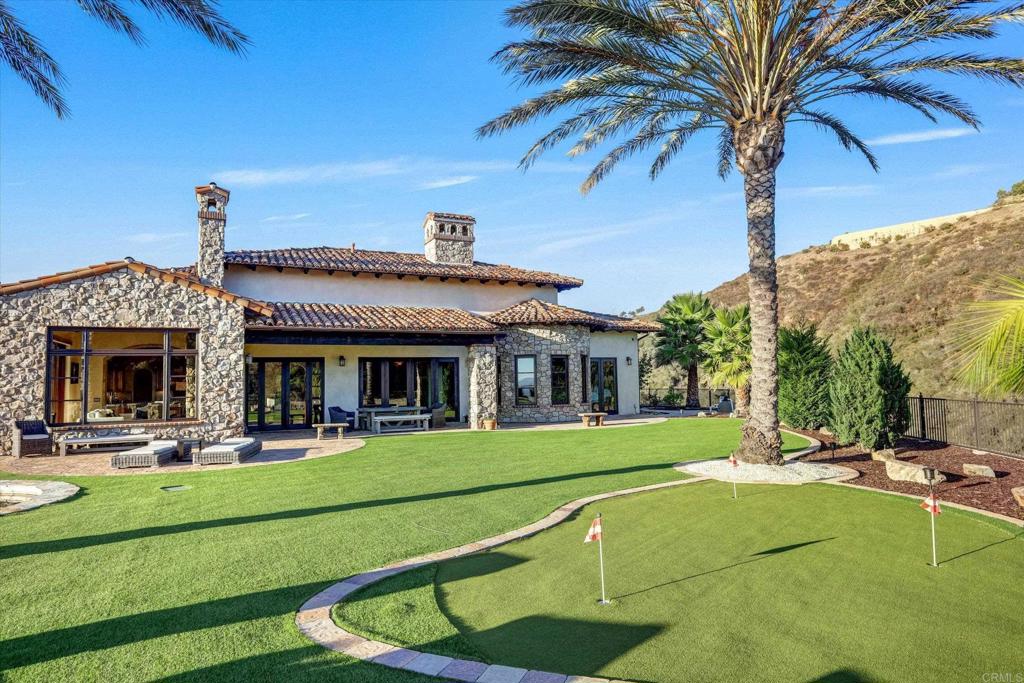 18179 El Brazo Rancho Santa Fe, CA 92067 - Photo 47 of 69 a view of a house with a swimming pool