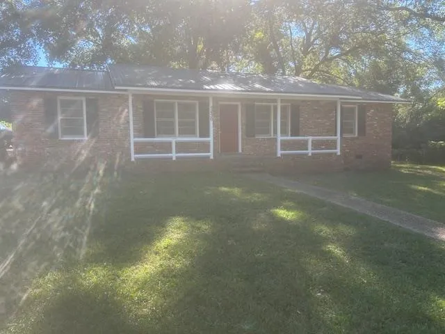 a view of an empty room with a yard