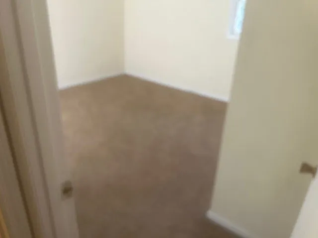 a close up of a white marble wall