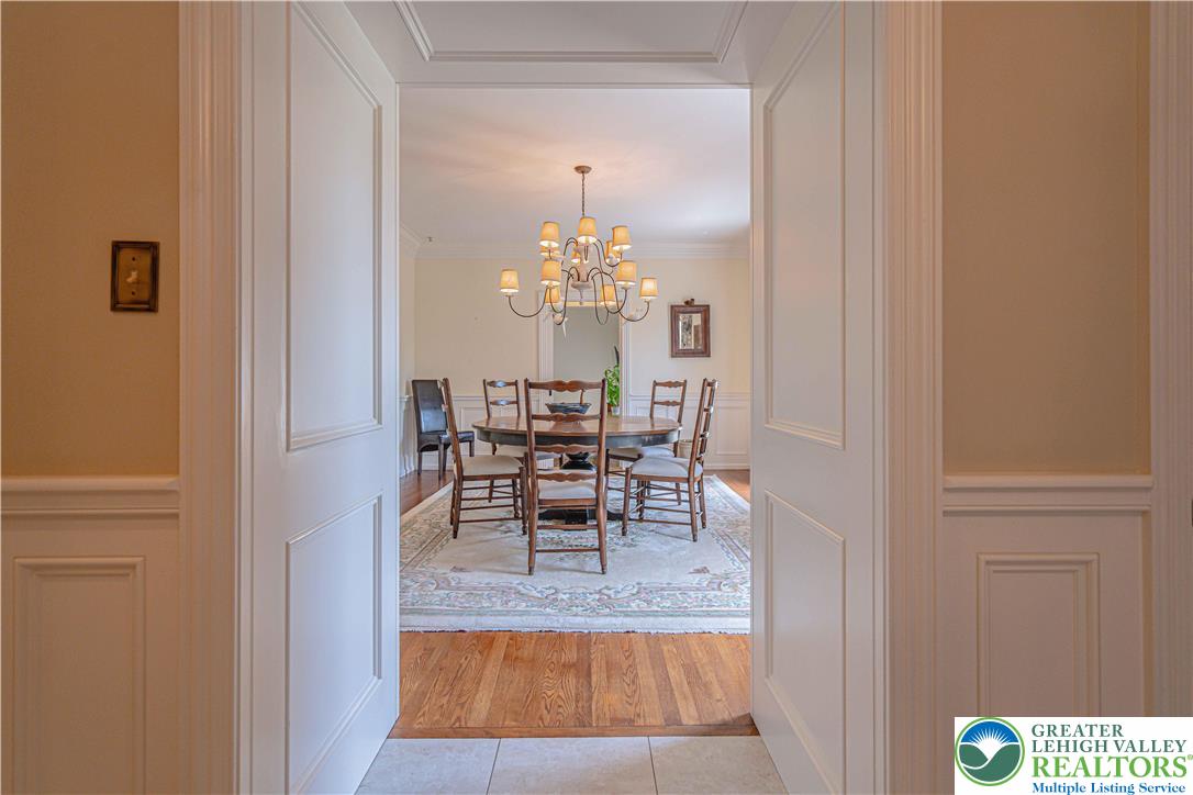 1825 Sherwood Road Allentown, PA 18103 - Photo 14 of 67 a view of a dining room with furniture and chandelier