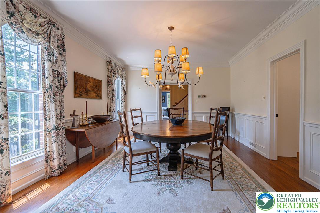 1825 Sherwood Road Allentown, PA 18103 - Photo 16 of 67 a view of a dining room with furniture and wooden floor