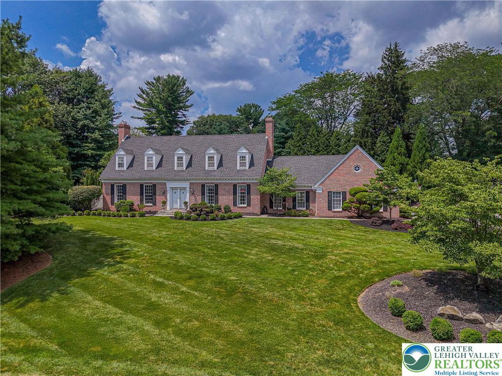 1825 Sherwood Road Allentown, PA 18103 - Photo 2 of 67 a front view of a house with garden