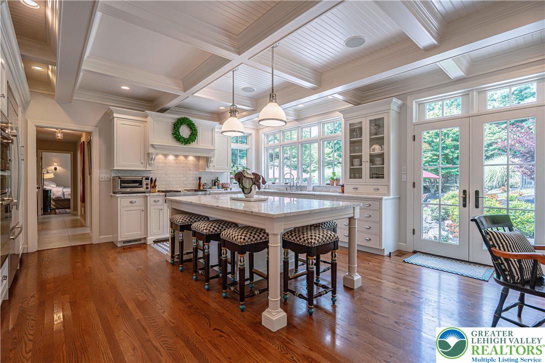 1825 Sherwood Road Allentown, PA 18103 - Photo 21 of 67 a dining table with chairs and wooden floor
