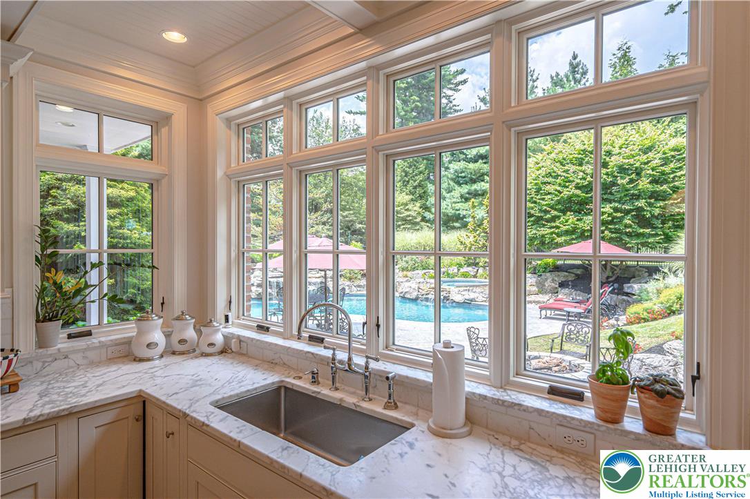 1825 Sherwood Road Allentown, PA 18103 - Photo 25 of 67 a kitchen with a sink and a large window