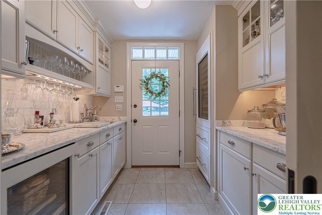 1825 Sherwood Road Allentown, PA 18103 - Photo 31 of 67 a kitchen with a sink and cabinets