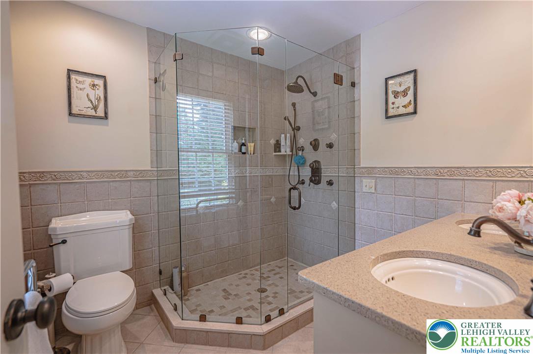 1825 Sherwood Road Allentown, PA 18103 - Photo 43 of 67 a bathroom with a sink a toilet and shower