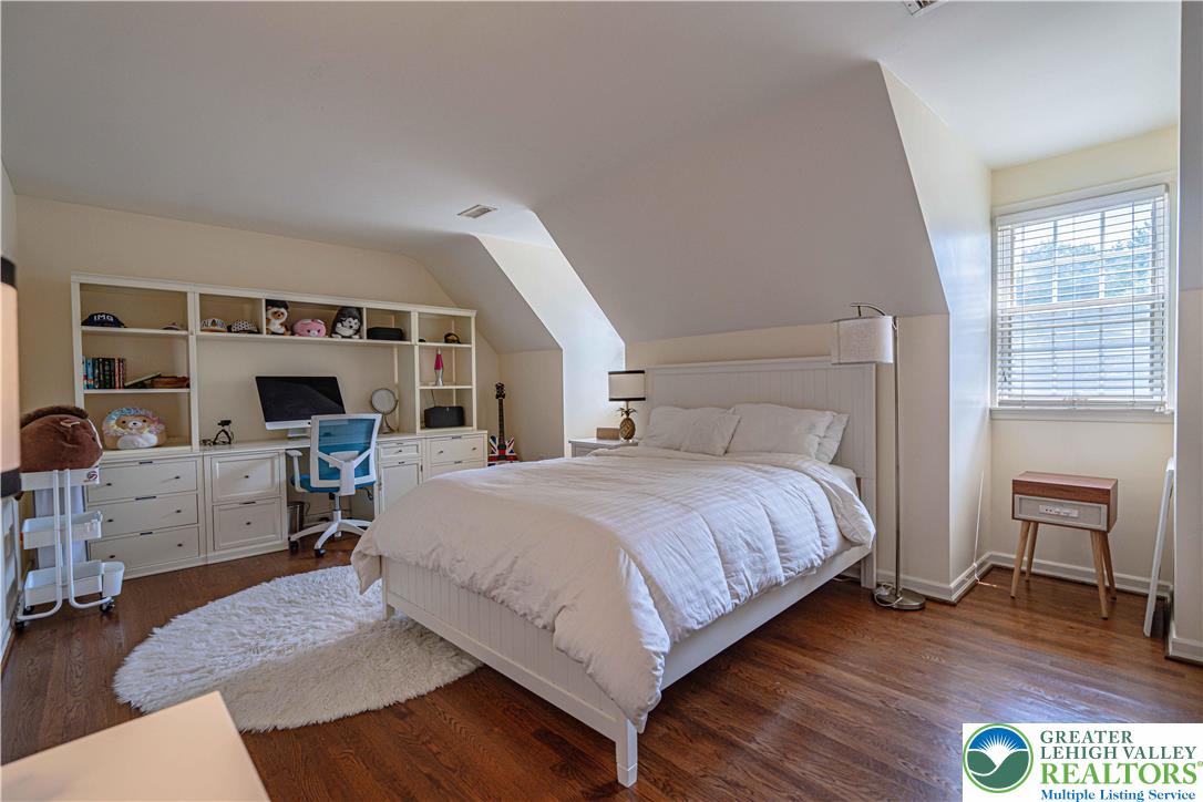 1825 Sherwood Road Allentown, PA 18103 - Photo 45 of 67 a bedroom with a large bed and a tv