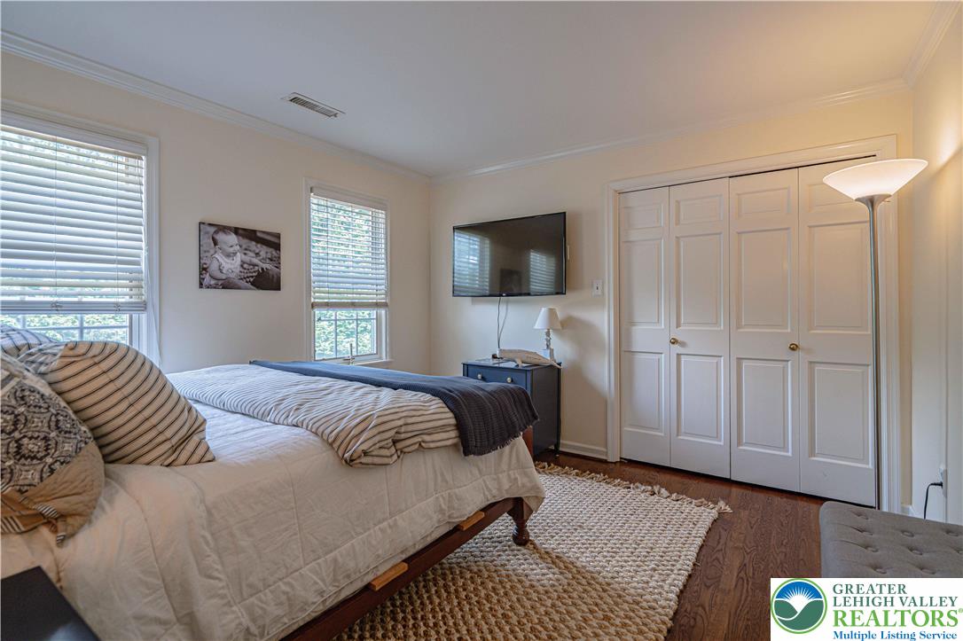 1825 Sherwood Road Allentown, PA 18103 - Photo 49 of 67 a bedroom with a bed and a television