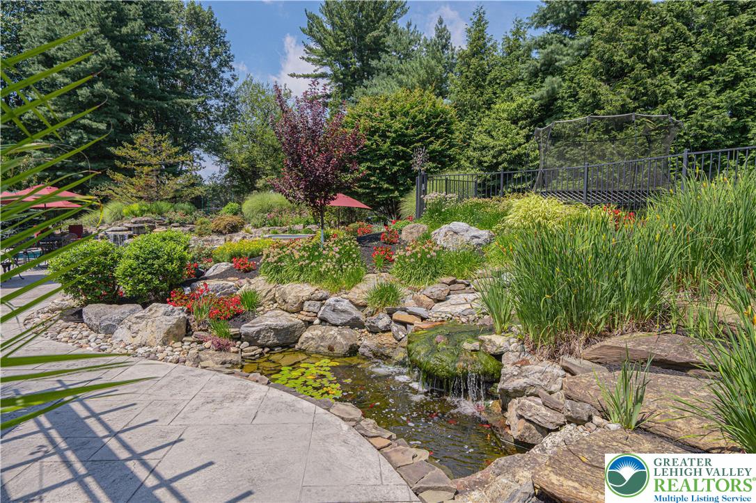 1825 Sherwood Road Allentown, PA 18103 - Photo 57 of 67 a view of a lake with a tree