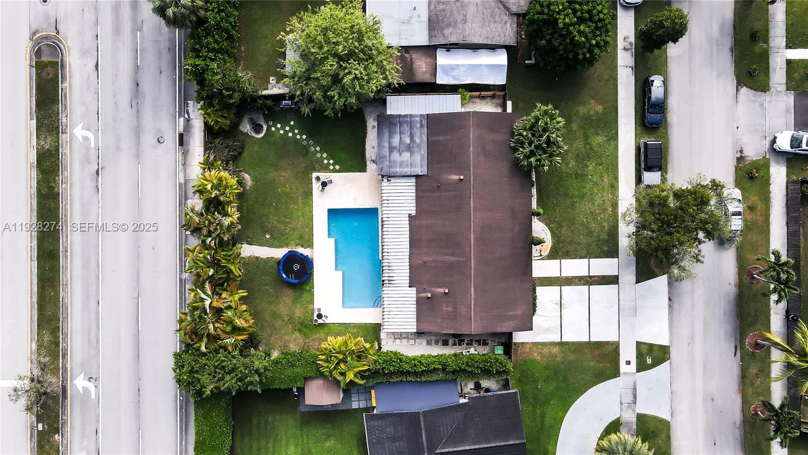 10511 Southwest 122nd Court Miami, FL 33186 - Photo 4 of 36 an aerial view of a house with a yard and garden