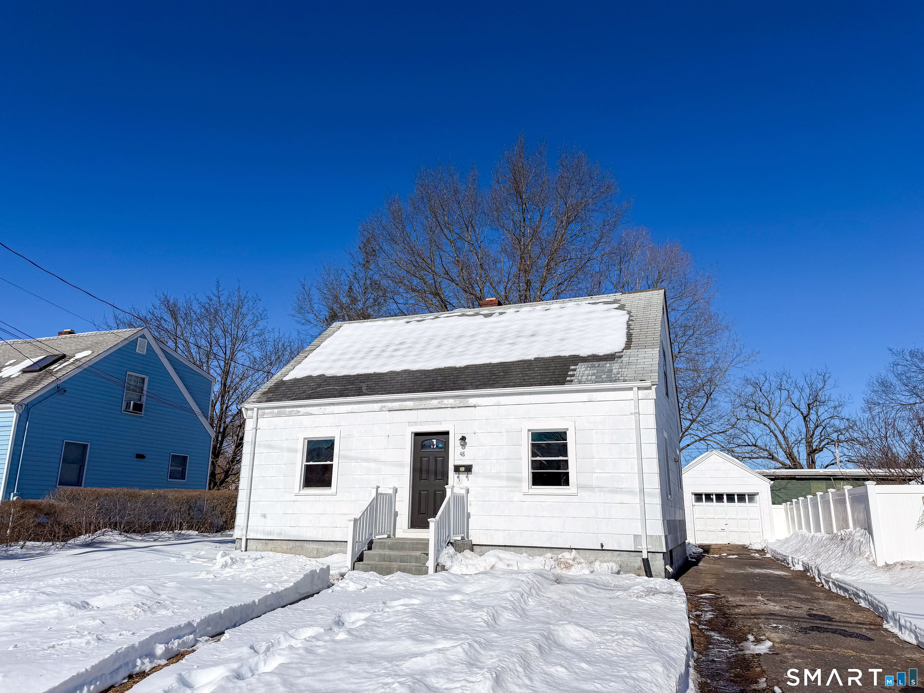 a house view with a outdoor space