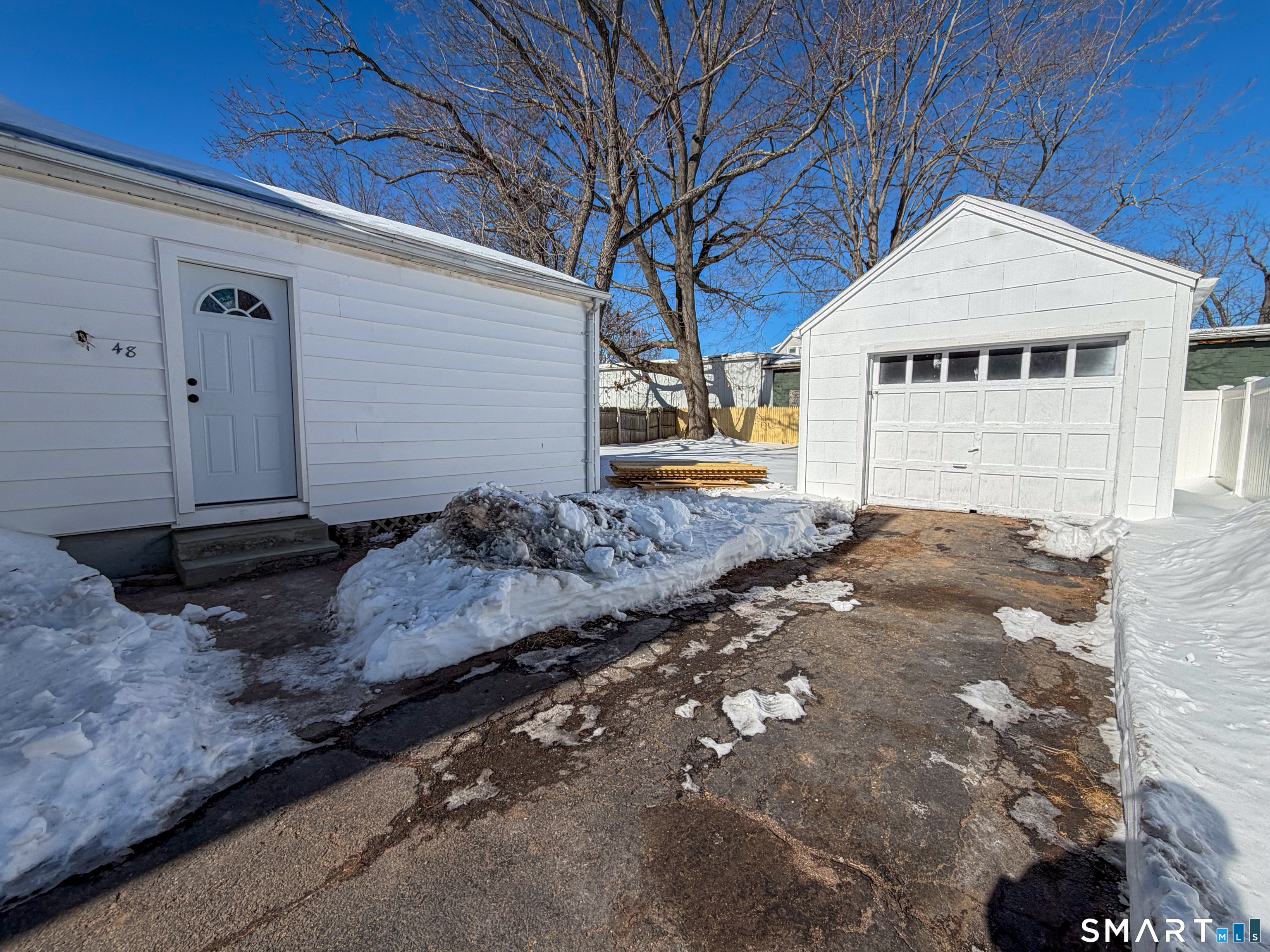 48 Rockwood Road Hamden, CT 06514 - Photo 16 of 17 a view of a house with a yard
