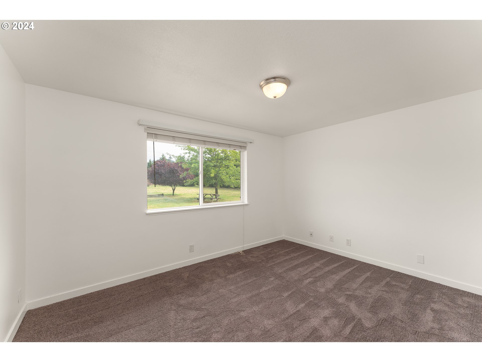 510 Reston Road Tenmile, OR 97481 - Photo 15 of 36 an empty room with a window
