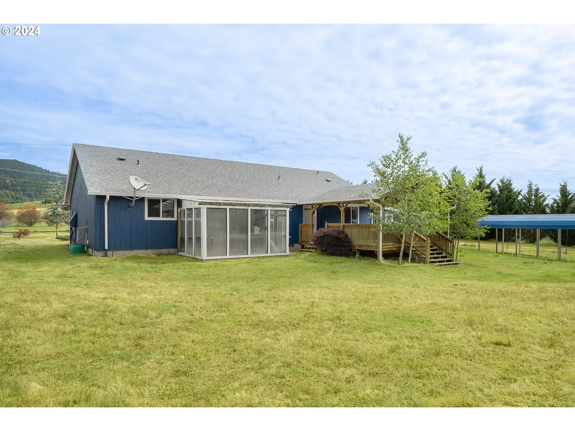 510 Reston Road Tenmile, OR 97481 - Photo 20 of 36 a front view of a house with a garden