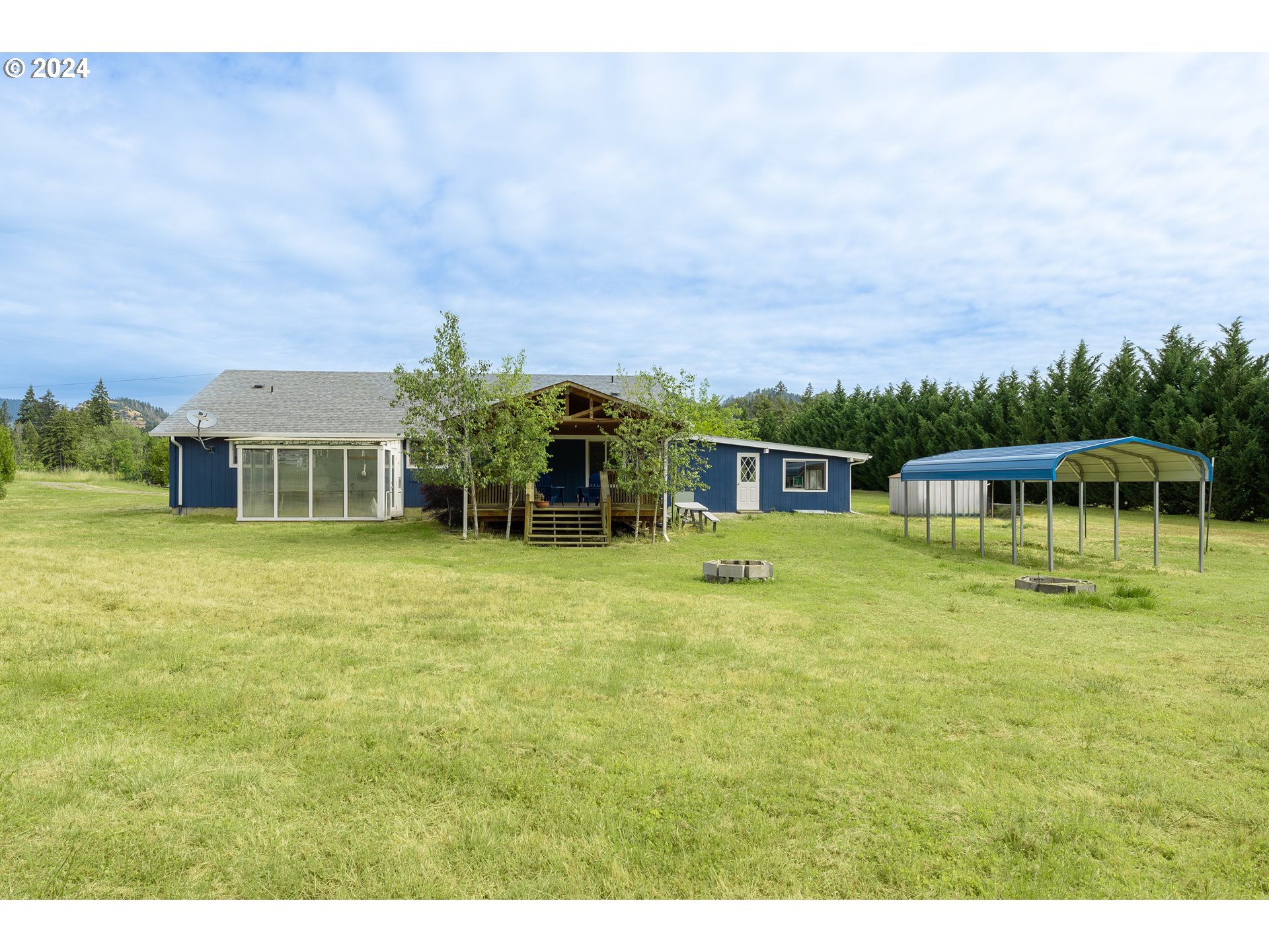 510 Reston Road Tenmile, OR 97481 - Photo 21 of 36 a front view of a house with a garden