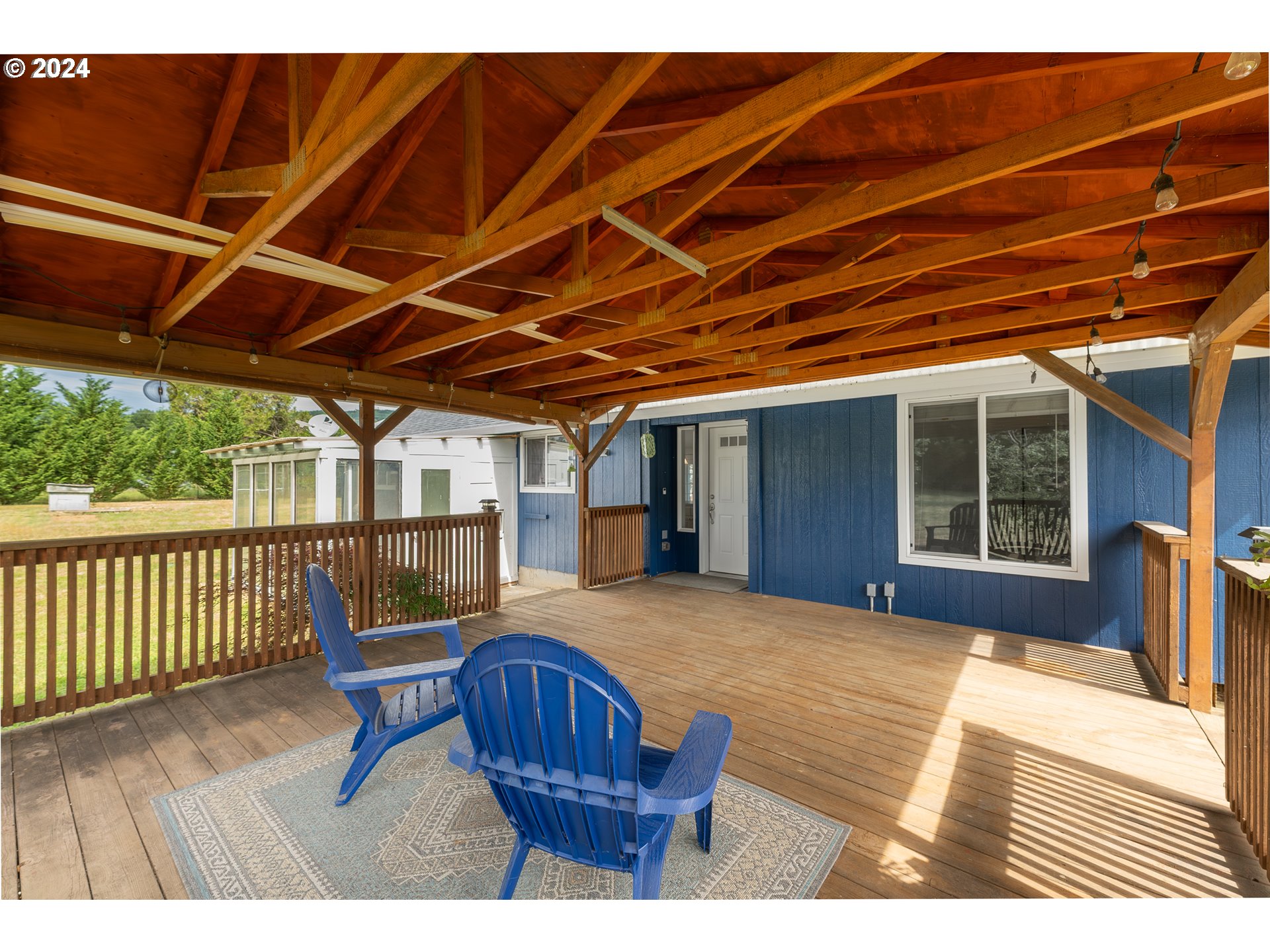 510 Reston Road Tenmile, OR 97481 - Photo 23 of 36 a view of a chair and table in the patio