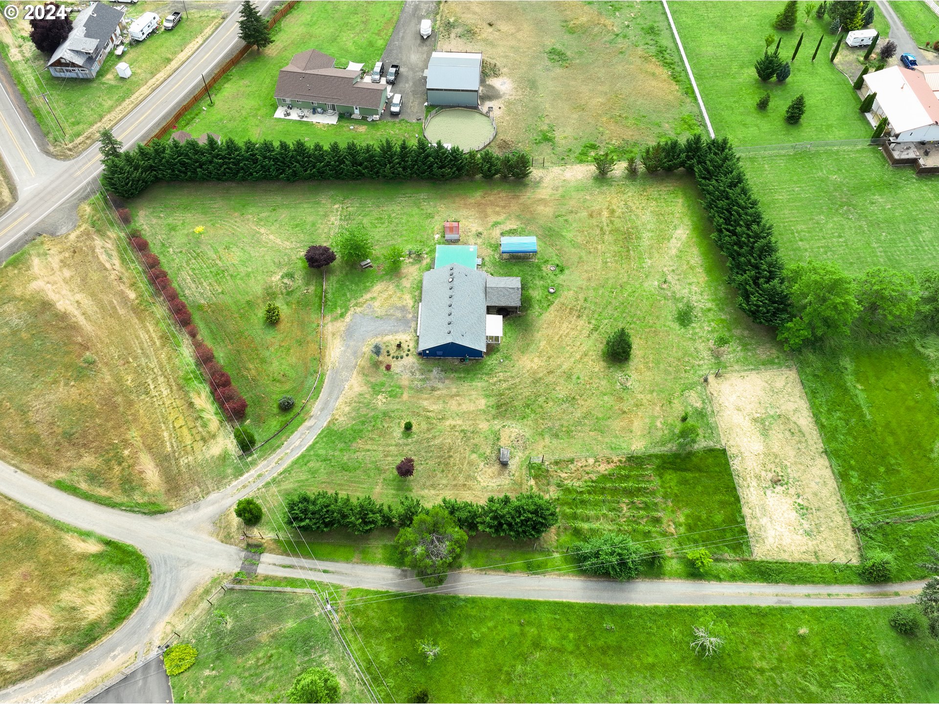 510 Reston Road Tenmile, OR 97481 - Photo 33 of 36 an aerial view of a house with a yard and lake view