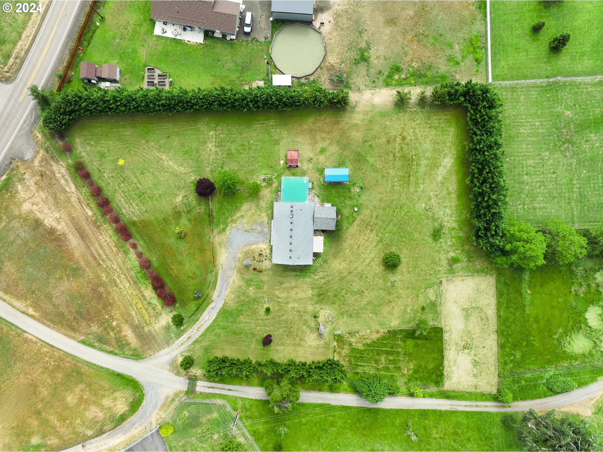 510 Reston Road Tenmile, OR 97481 - Photo 34 of 36 an aerial view of a house with a yard and lake view