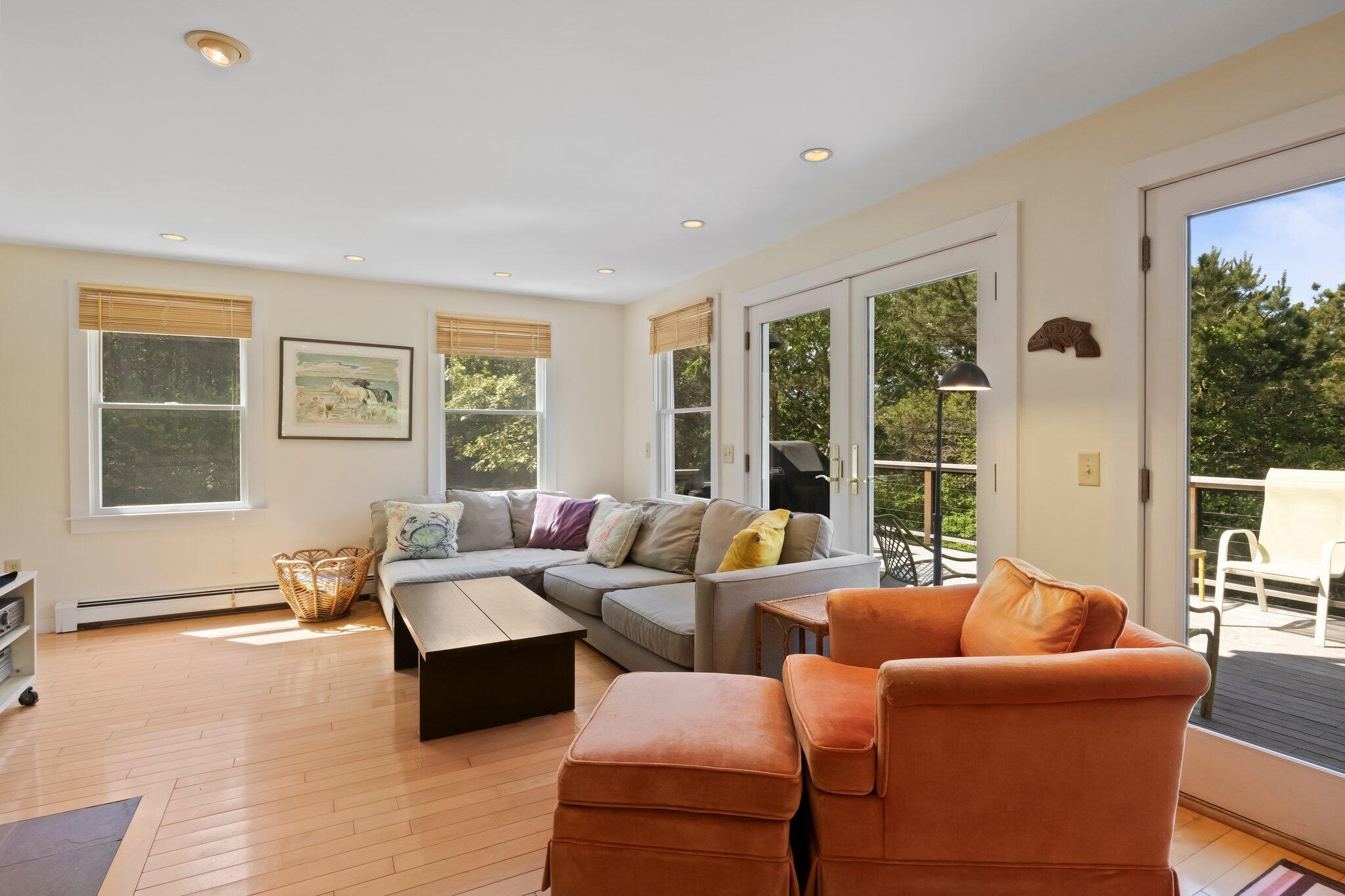 112 Castle Road Truro, MA 02666 - Photo 11 of 43 a living room with furniture and a window