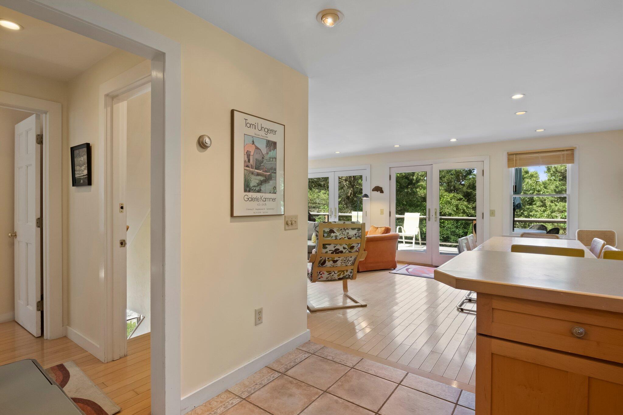 112 Castle Road Truro, MA 02666 - Photo 16 of 43 a living room with furniture and large windows