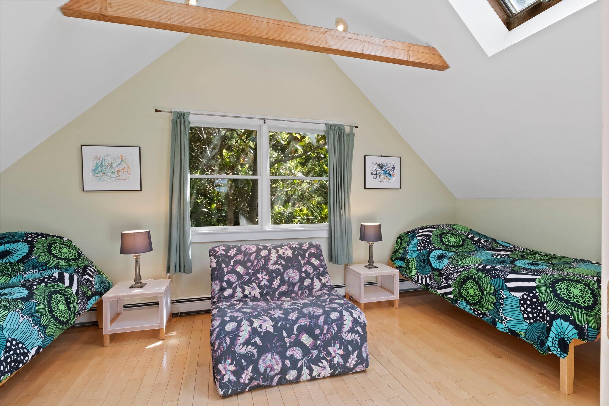 112 Castle Road Truro, MA 02666 - Photo 25 of 43 a bed room with a bed and a couch