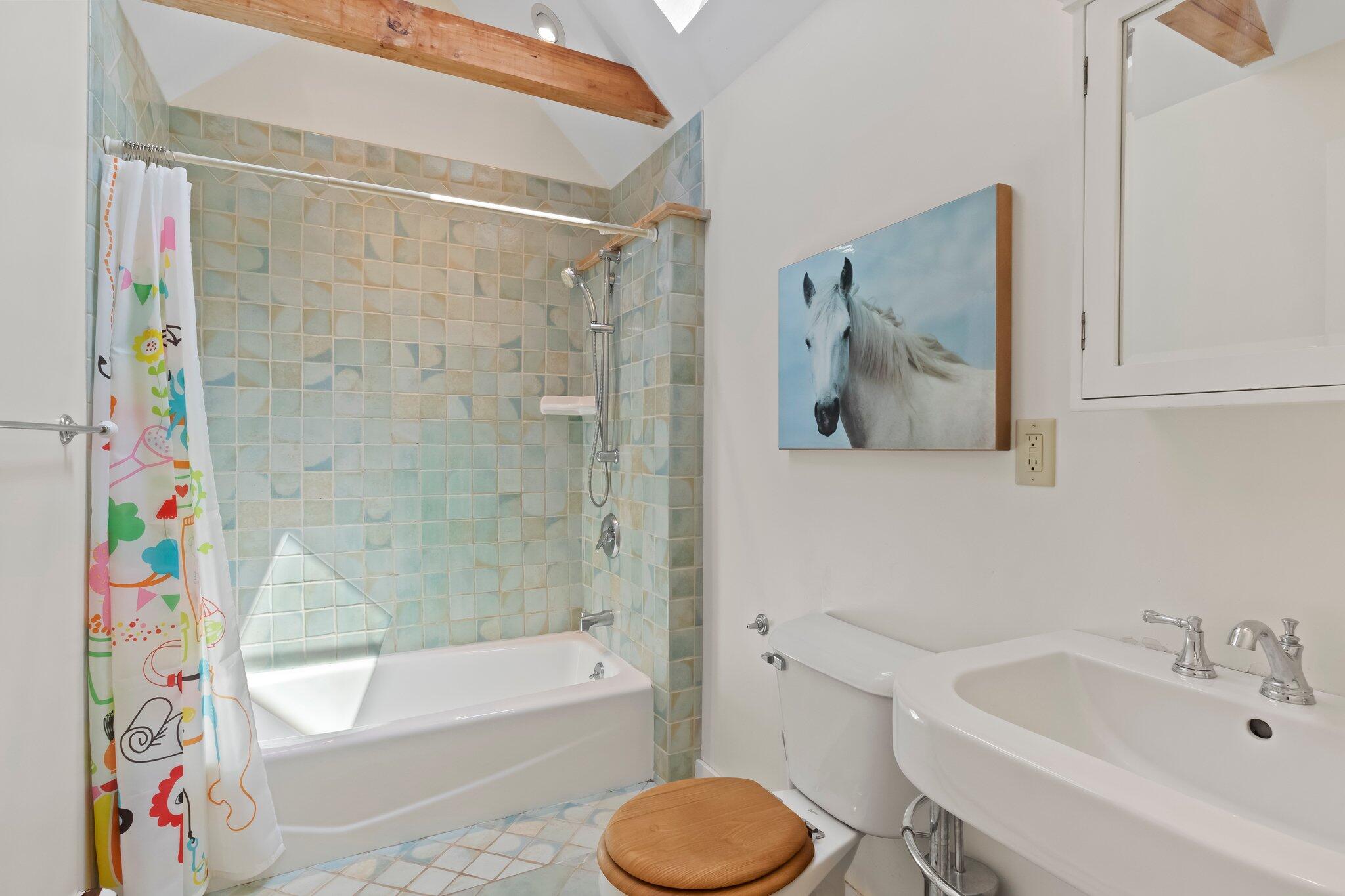 112 Castle Road Truro, MA 02666 - Photo 27 of 43 a bathroom with a sink toilet and bathtub