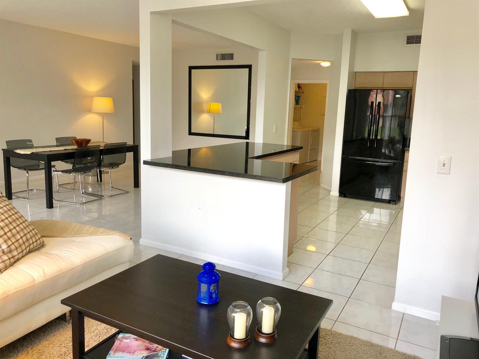 5801 Coach House Circle, Unit D Boca Raton, FL 33486 - Photo 11 of 34 Living room